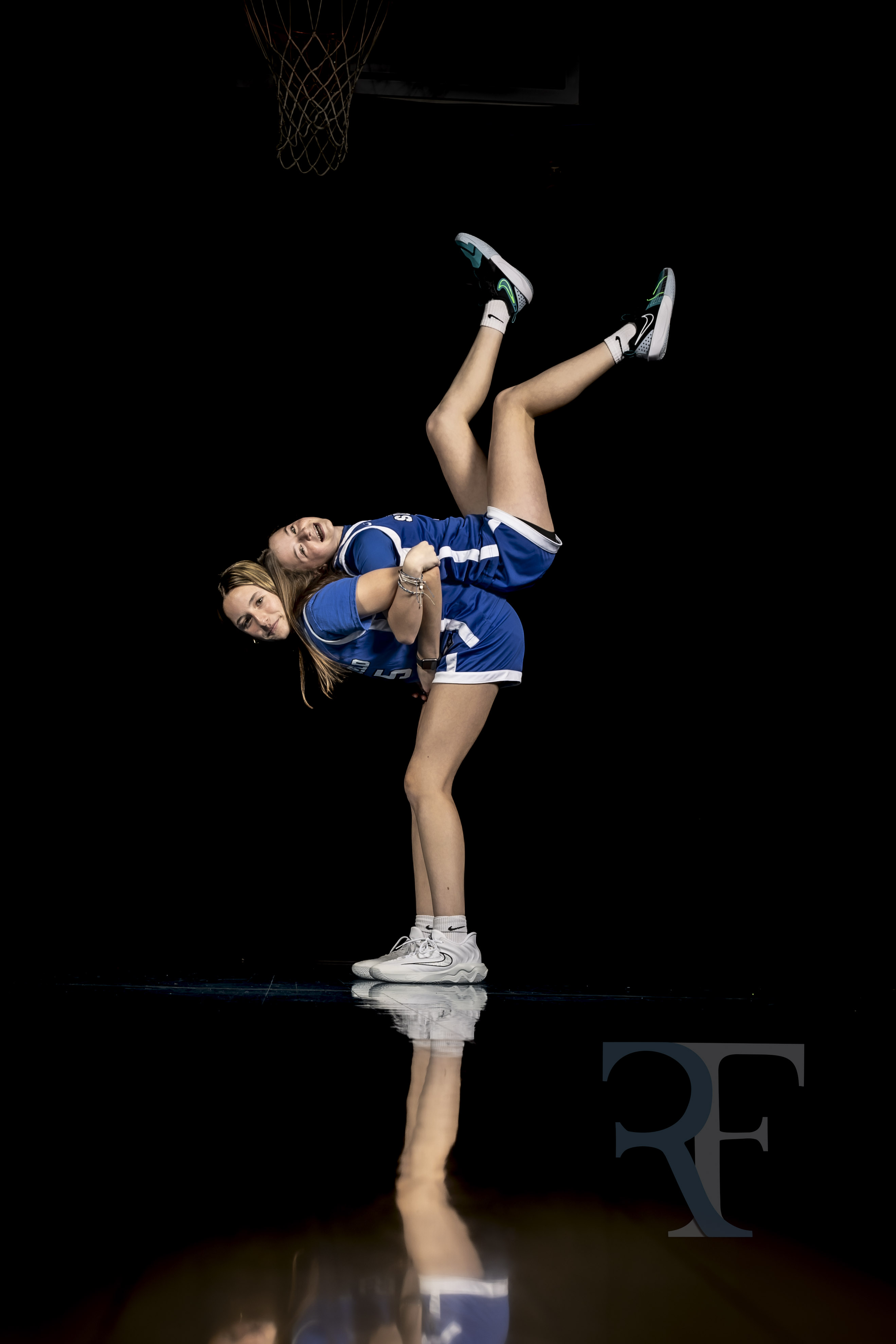 High School basketball players in Suffield, CT have fun posing for Sports Photographer
