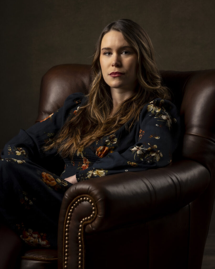 West Hartford CT Professional Headshots Photographer | High Quality Professional Business Headshots Woman Sitting In Chair In Photography Studio For Linkedin Headshots