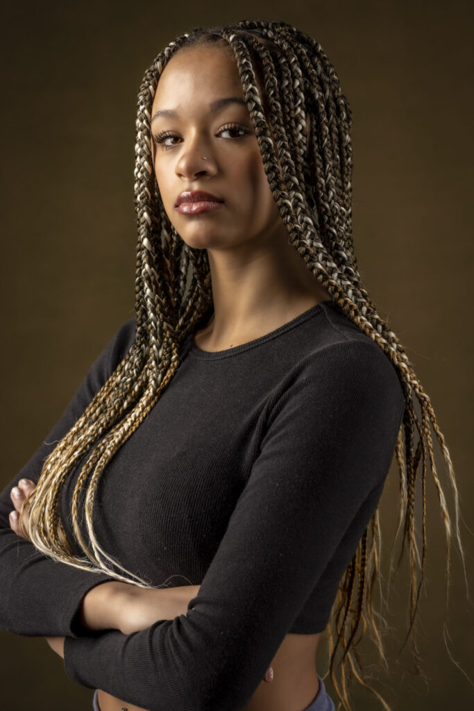 Suffield, CT, Northern Connecticut and Western Massachusetts Professional Headshots Photographer | Casual Look Headshots With Personality | Woman Gazing At Camera Intently