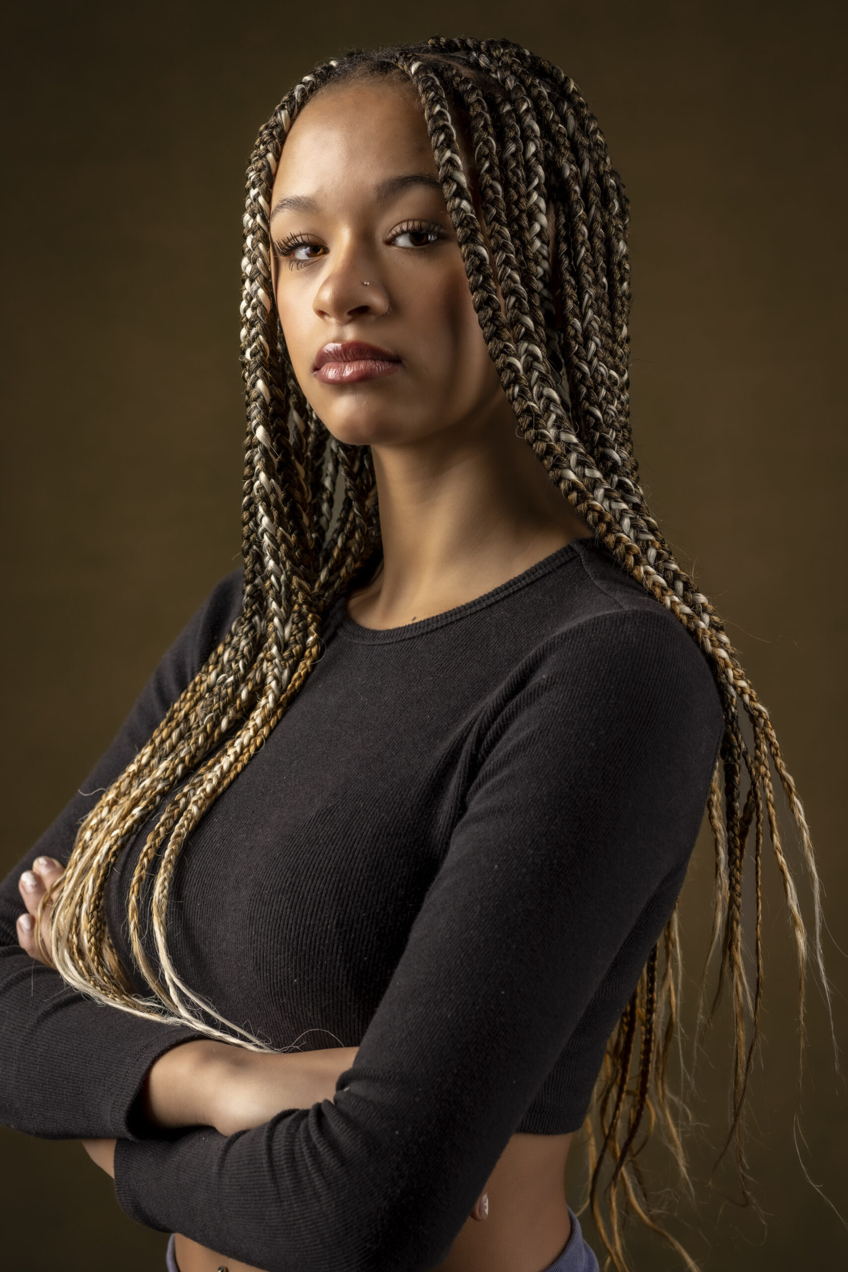 Suffield, CT, Northern Connecticut and Western Massachusetts Professional Headshots Photographer | Casual Look Headshots With Personality | Woman Gazing At Camera Intently