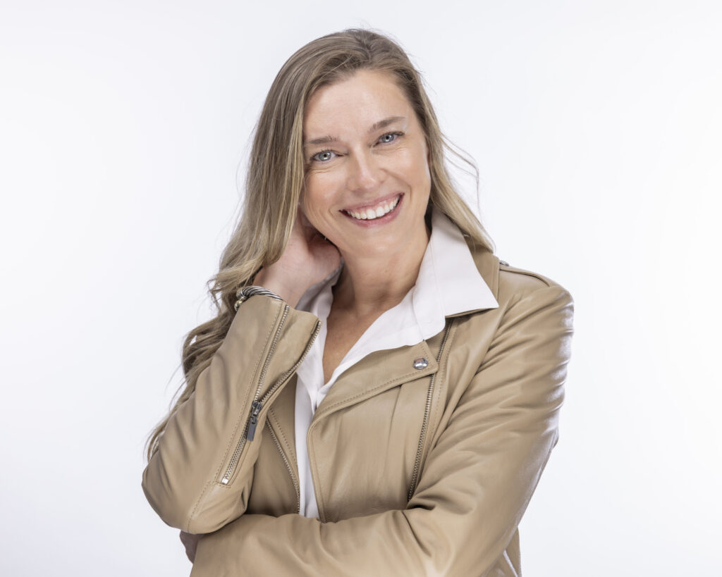 Suffield, CT | Northern Connecticut and Western Massachusetts Professional Headshots Photographer | Casual Look Headshots With Personality | Woman on white backdrop posing for Linkedin Photos