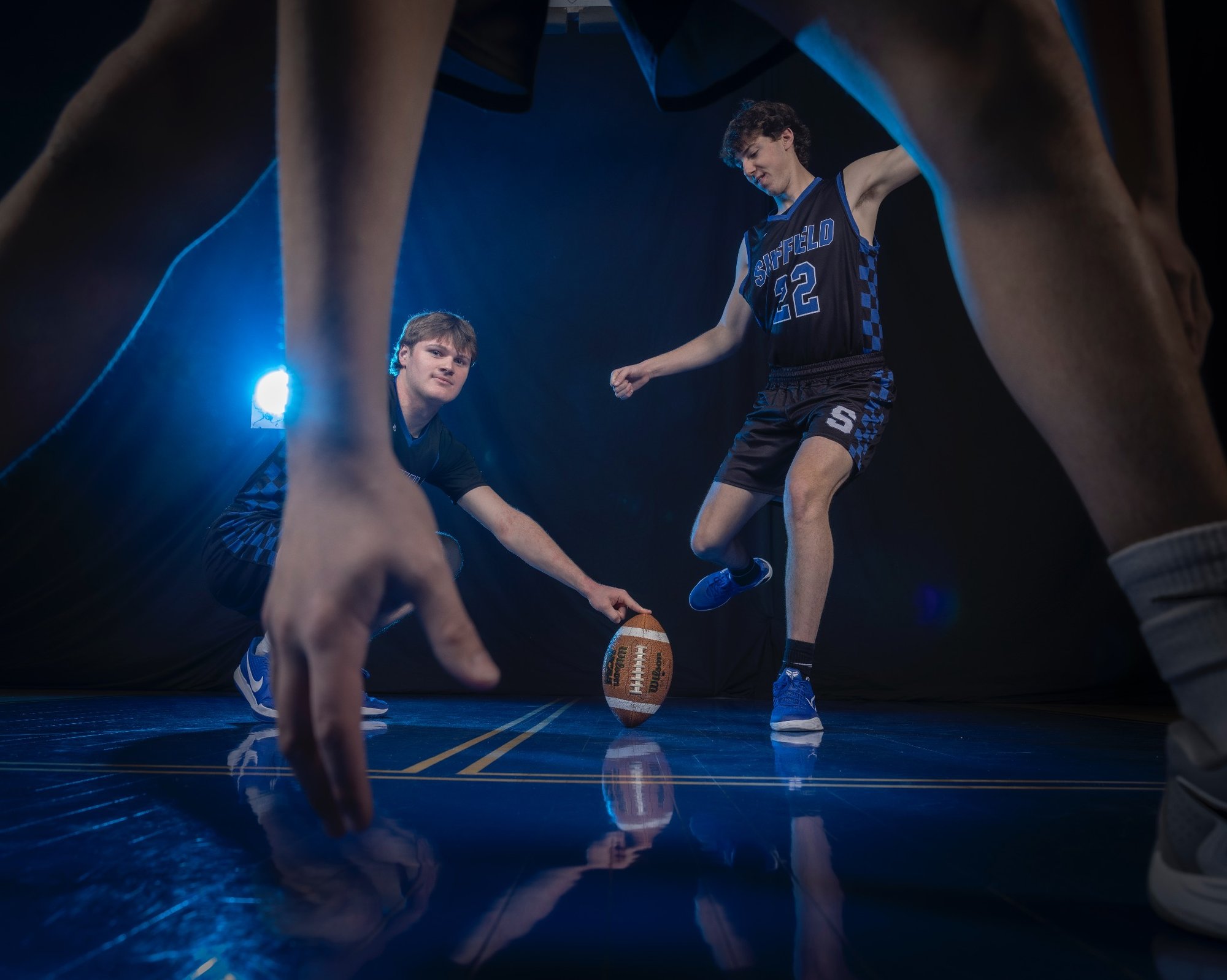 Creative basketball media day photo showcasing team chemistry during a high school media day in Massachusetts