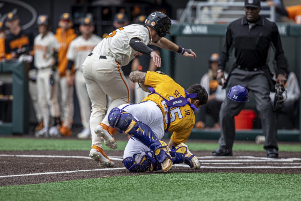 Rob Faber Photography | University of Tennessee Sports Photographer | Tennessee runner colliding with LSU catcher at home plate in high-impact play