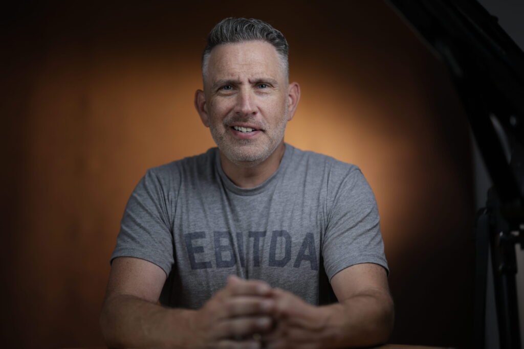 Rob Faber Photography | Self Portrait | Rob Faber in Grey t-shirt that reads EBITDA