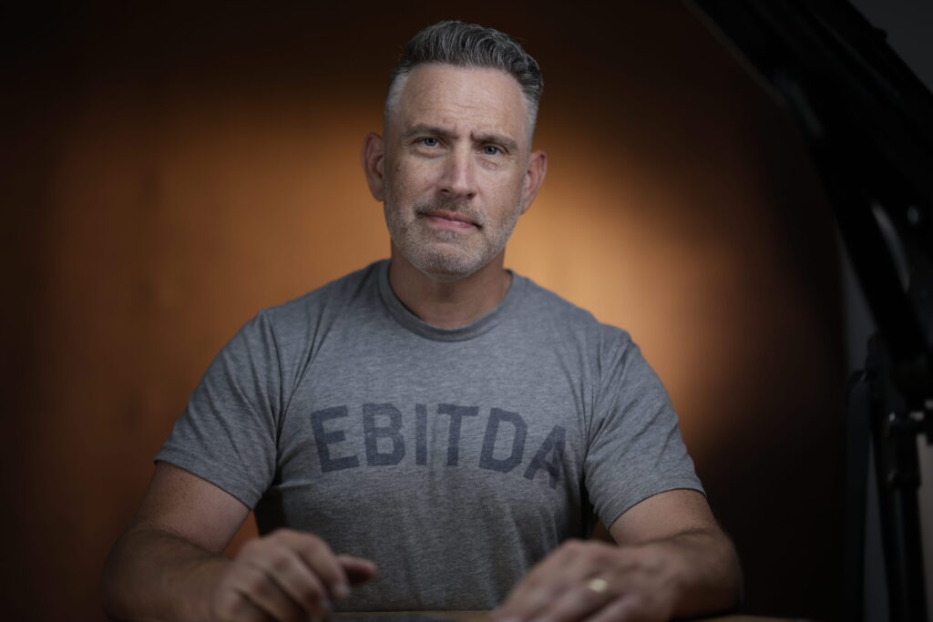 Rob Faber Photography | Self Portrait | Rob Faber in Grey t-shirt that reads EBITDA