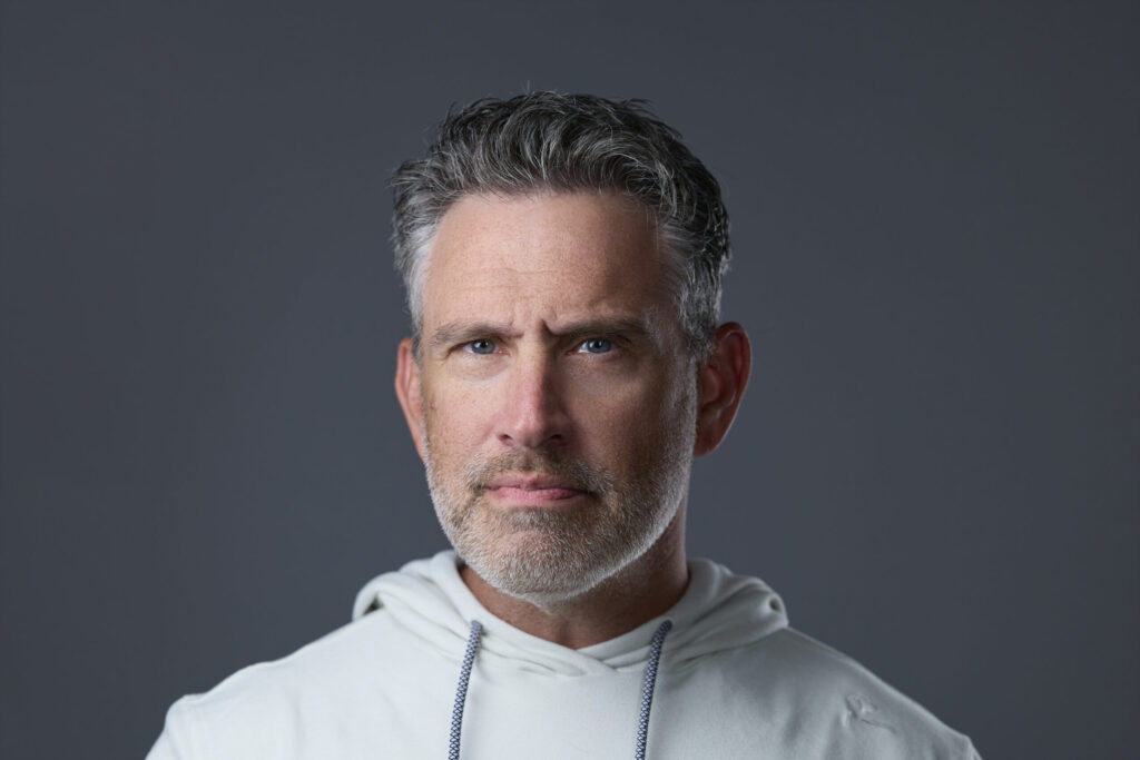 LinkedIn Headshot | Rob Faber | Rob Faber Photography | Man in white rhoback shirt with salt and peper hair and beard posing for a headshot. 