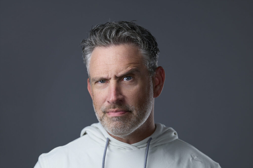 Rob Faber Photography | Self Portrait | headshot Psychology | Man with salt and pepper hair and beard poses with one eyebrow up. 